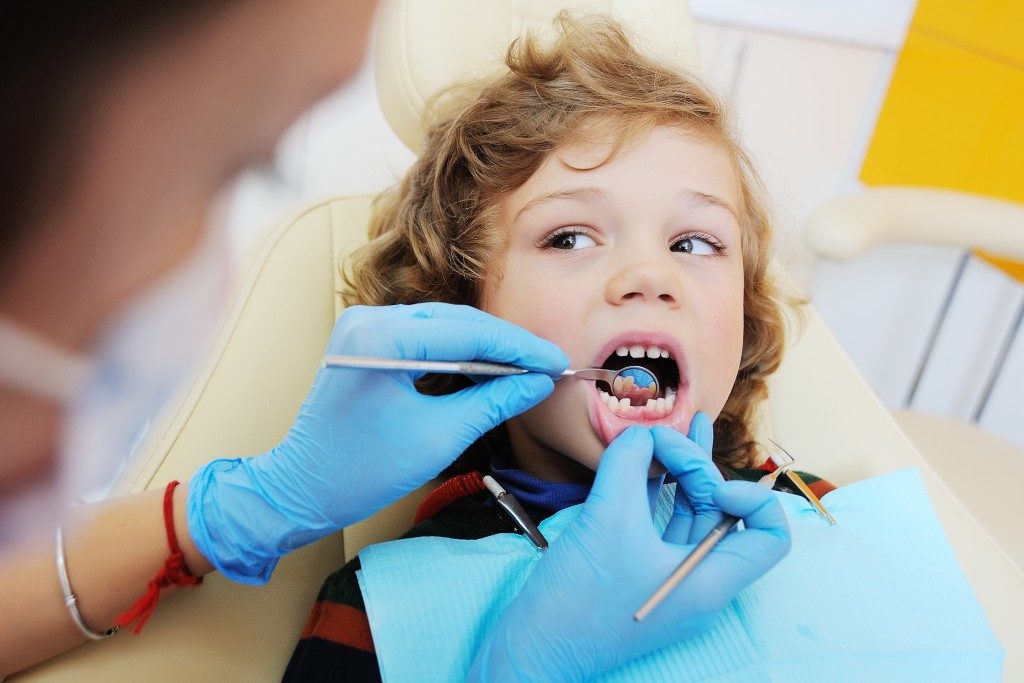 kid having dental checkup