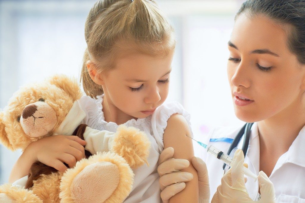 kid getting a vaccine