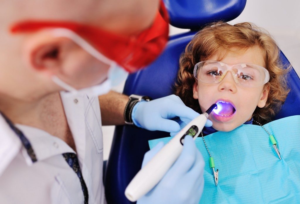 Child getting a dental checkup