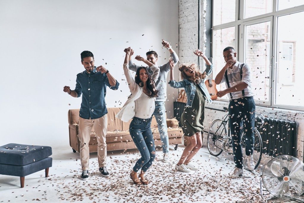 people dancing in the living room