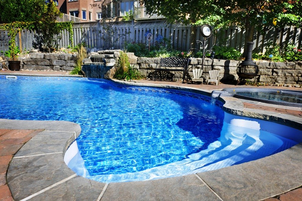 swimming pool in a home's backyard